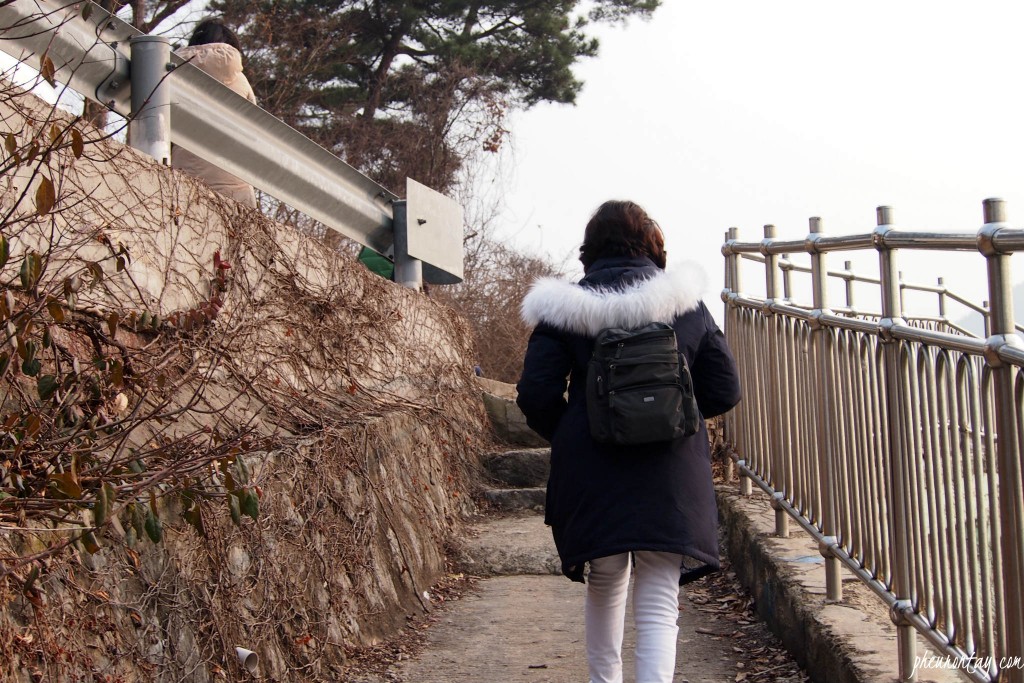 climbing uphill to wall painting village 